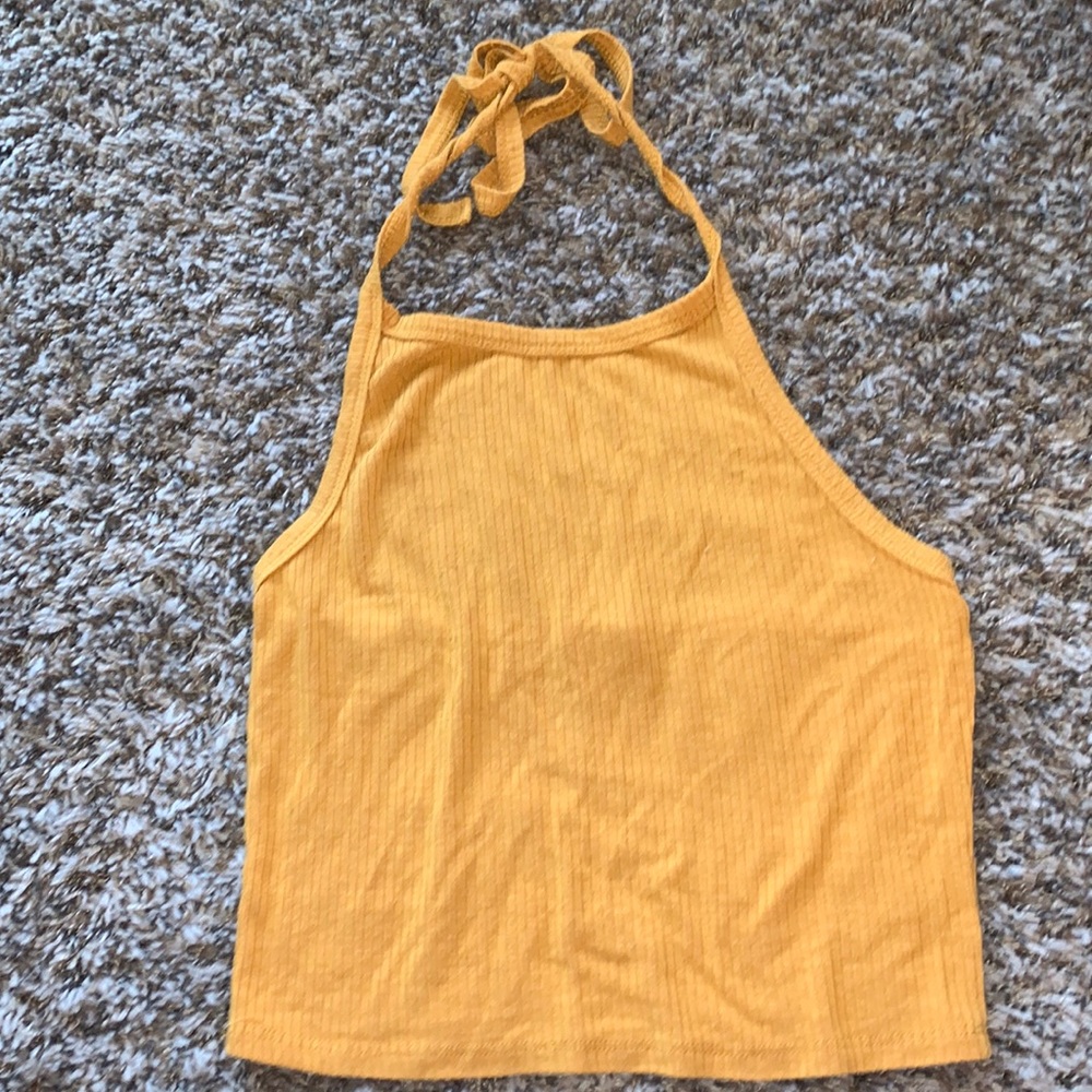 High neck crop tank top. Ties at the neck. Mustard yellow. Stretchy and Soft.